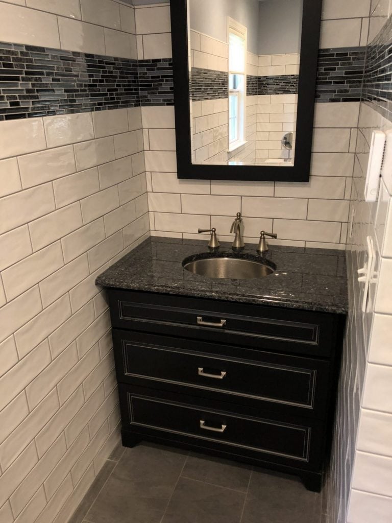 Bath Remodeling Subway Tile Dark Cabinet